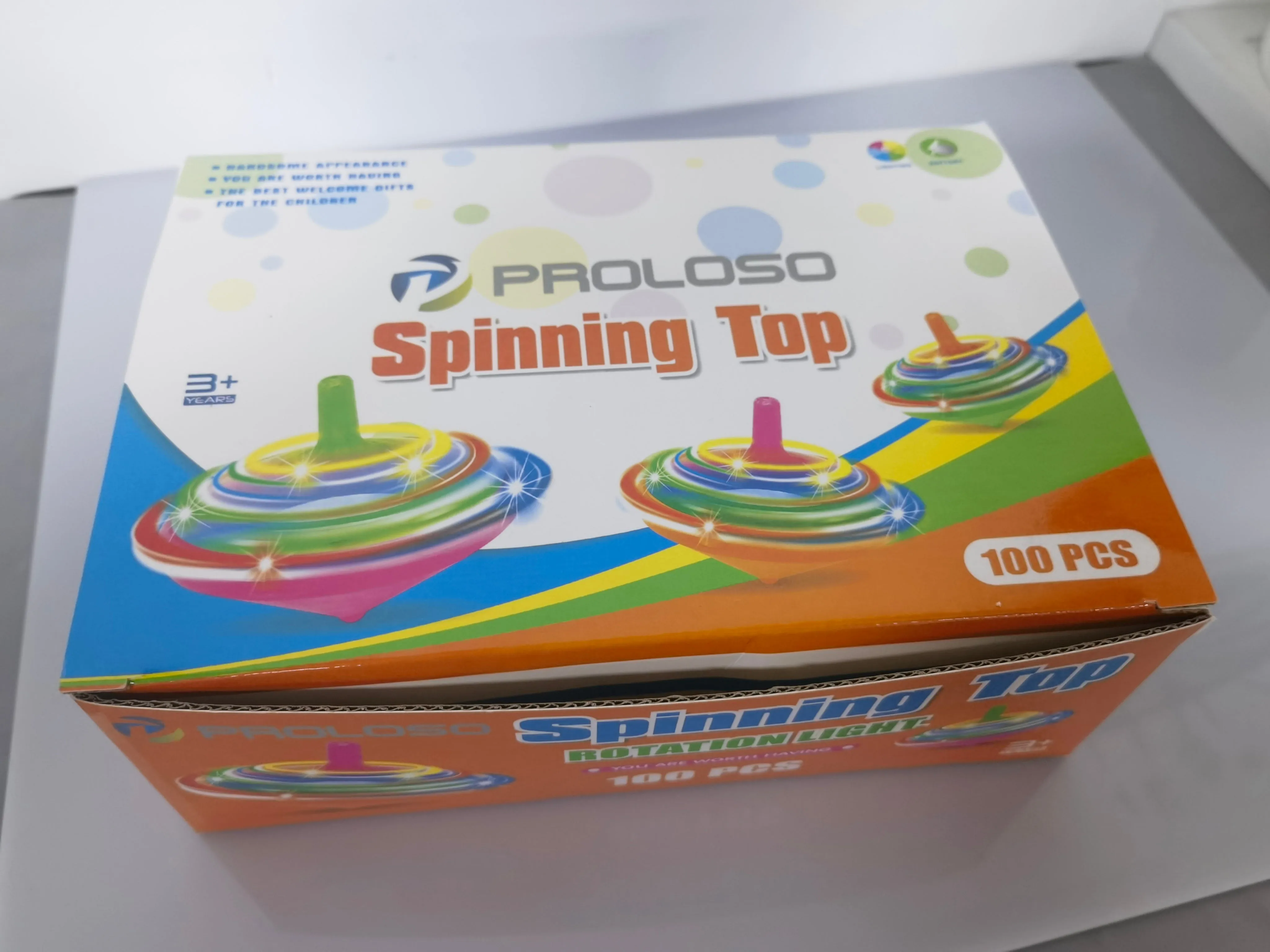 PROLOSO 100 Pcs Light Up Spinning Tops LED Flashing Spinners with Gyroscope Halloween Treats